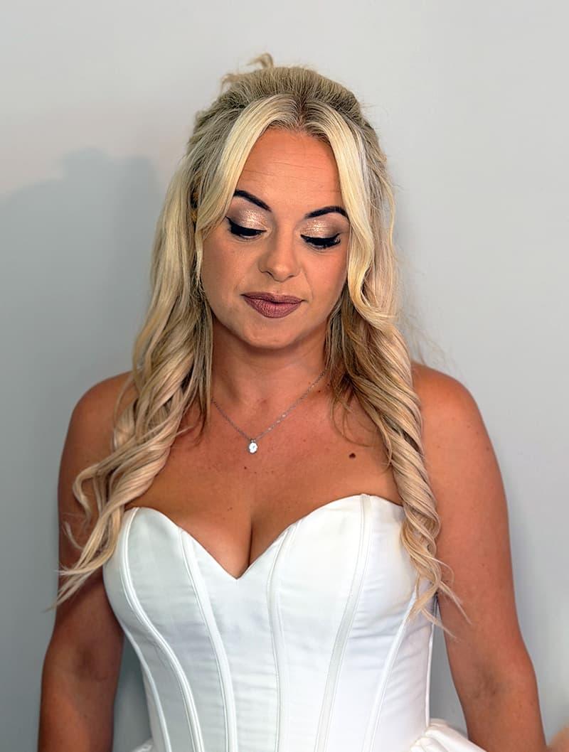 Radiant bridal makeup on client in Winchester